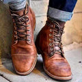 Men's lace-up ankle boots with rounded toes, metal eyelets and stitched soles