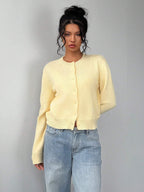 Women's knitted slim fit cardigan with long sleeves and button front