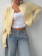Women's knitted slim fit cardigan with long sleeves and button front