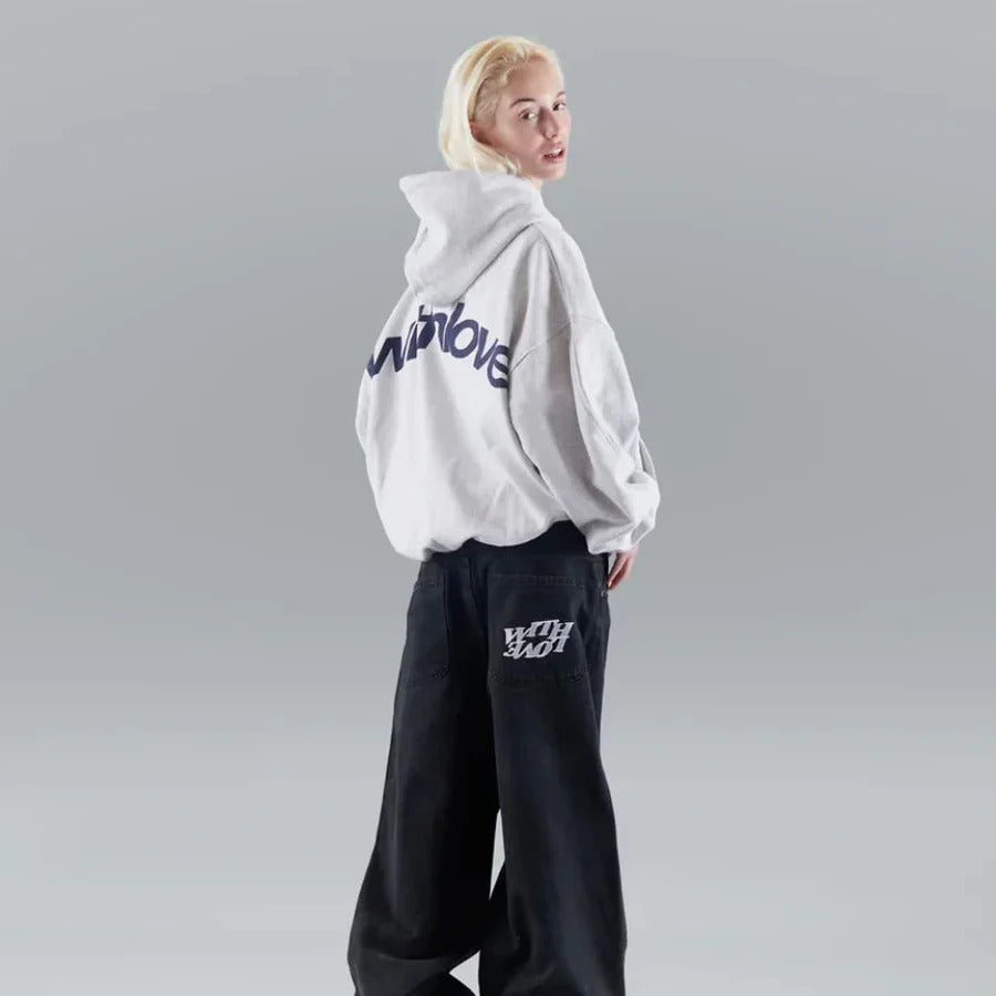Oversized hooded pullover hoodie with large graphic text on the back