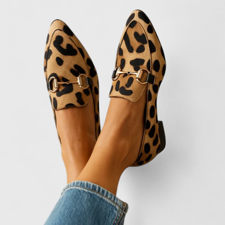 Women's brown leopard print pointed toe loafers with chain trim and low heels