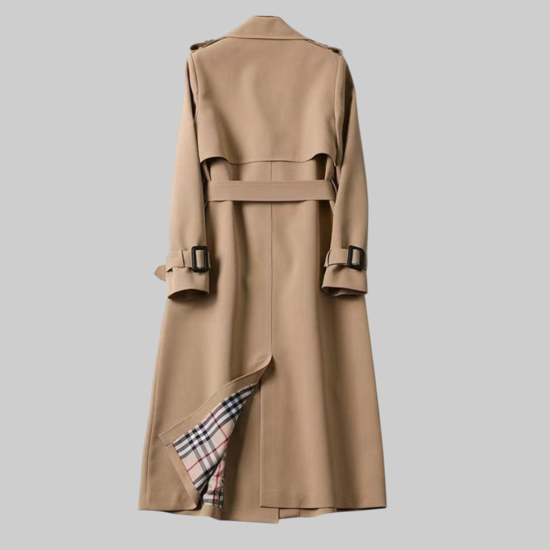 Women's double-breasted belted trench coat with long sleeves and buckle details