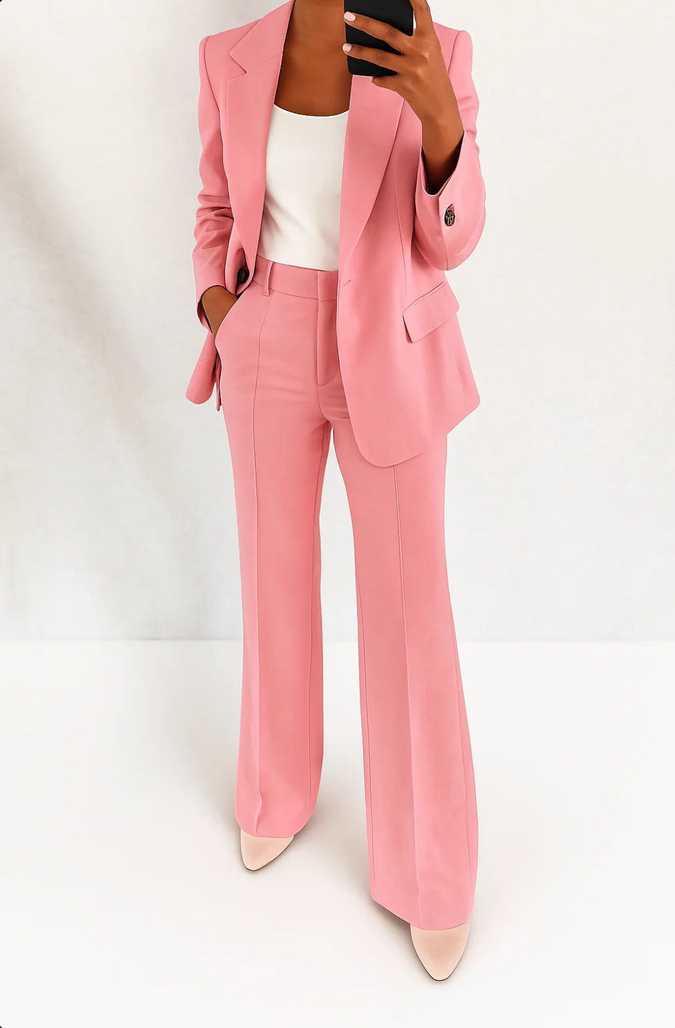 Women's two-piece trouser suit set with tailored blazer and full-length trousers