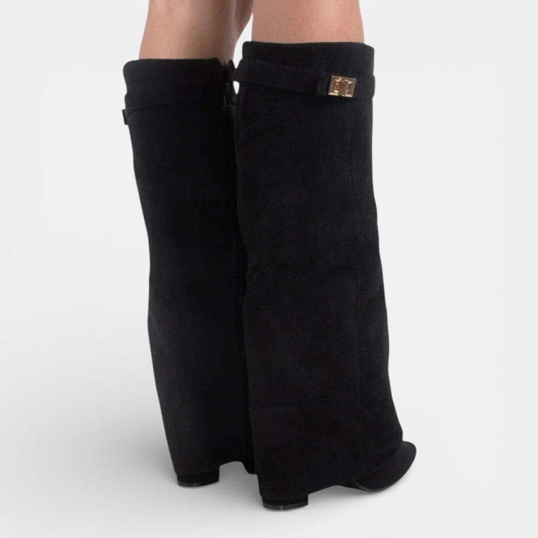 Women's knee high boots with pointed toes, block heels, side zips and buckle details