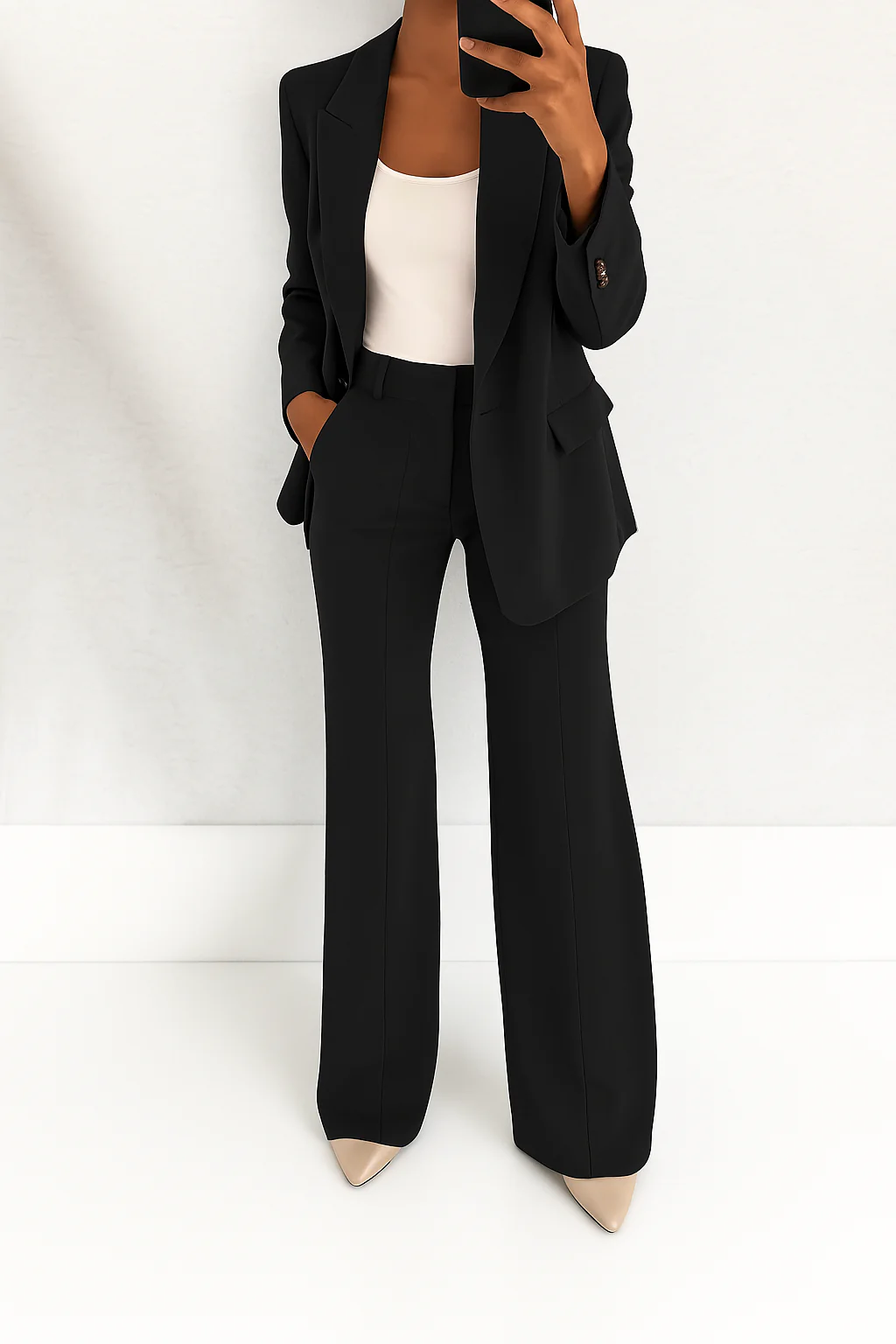 Women's two-piece trouser suit set with tailored blazer and full-length trousers