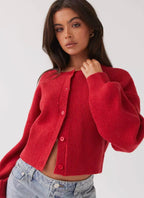 Women's red ribbed cropped cardigan with crew neckline and button front