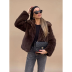 Women's dark brown faux fur coat with wide collar and long sleeves