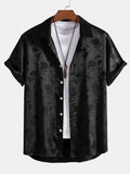 Men's short sleeve floral shirt with collared neckline and button front