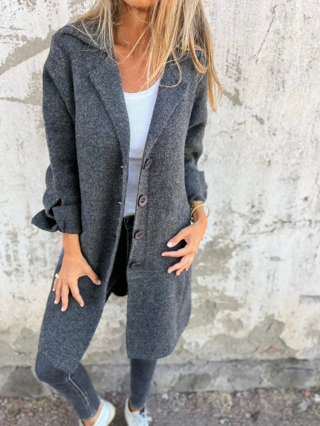 Women's longline button front coat with notched lapels and long sleeves