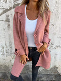 Women's longline button front coat with notched lapels and long sleeves
