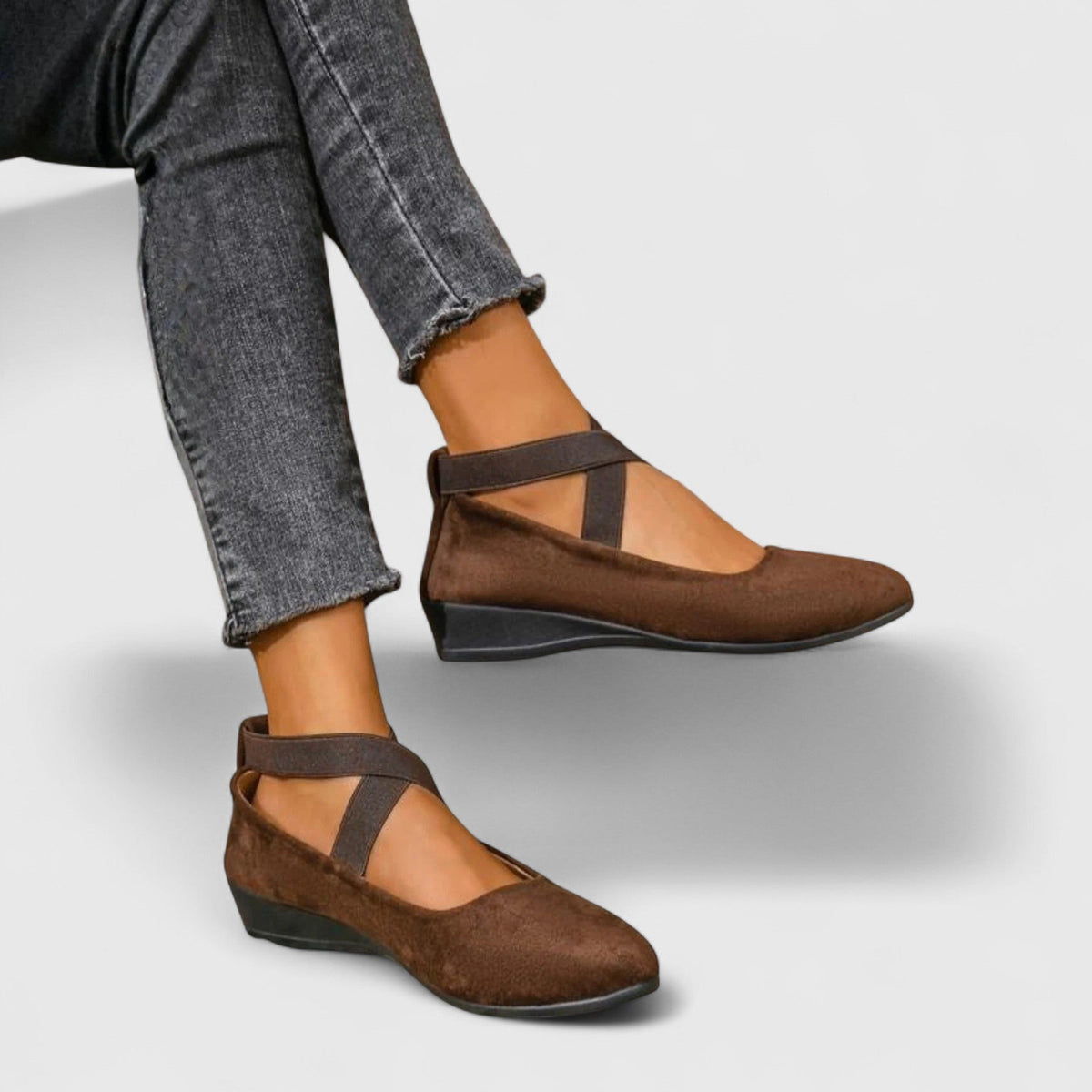 Women's strappy wedge shoes with Mary Jane-inspired cross straps and almond toe
