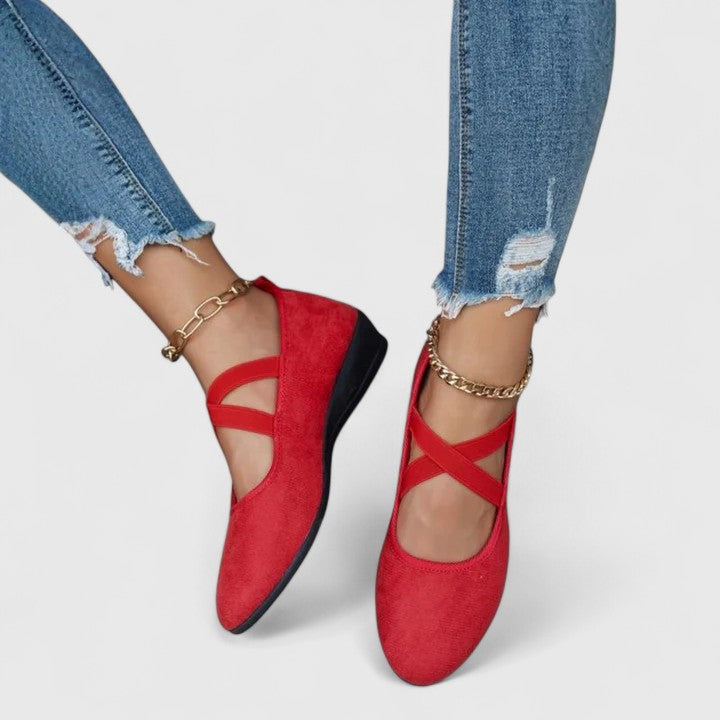 Women's strappy wedge shoes with Mary Jane-inspired cross straps and almond toe