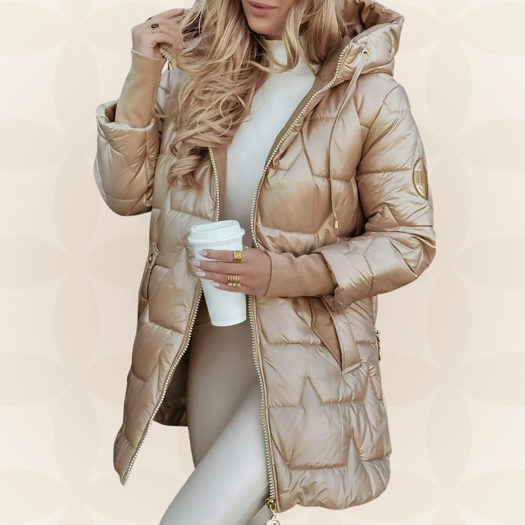 Women's longline hooded quilted winter jacket with zip front and ribbed cuffs