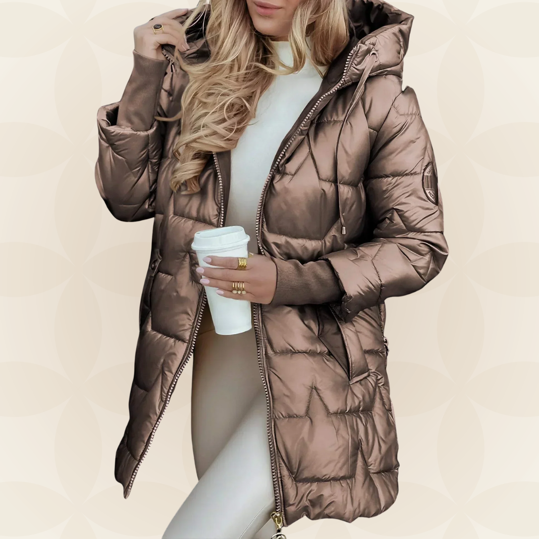 Women's longline hooded quilted winter jacket with zip front and ribbed cuffs