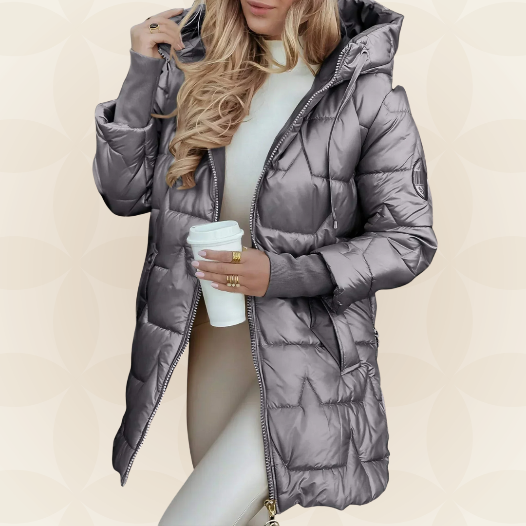 Women's longline hooded quilted winter jacket with zip front and ribbed cuffs