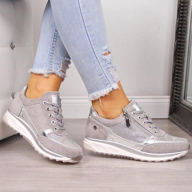 Women's low-top lace-up trainers with side zip and raised sole
