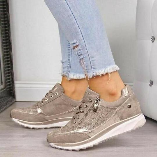 Women's low-top lace-up trainers with side zip and raised sole