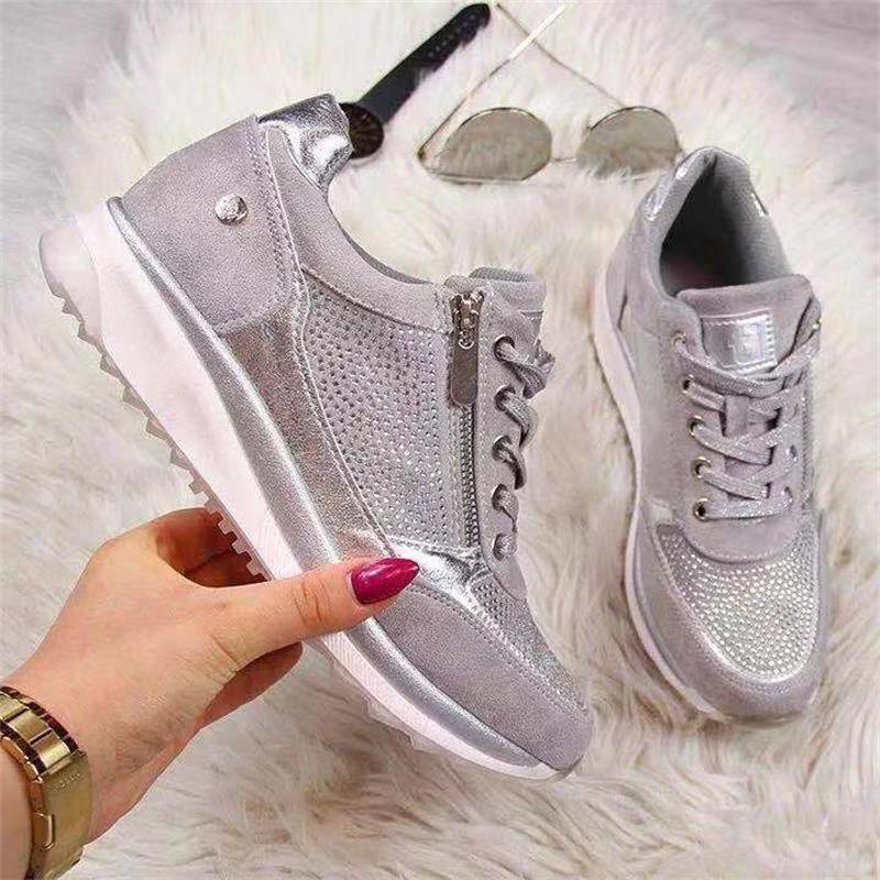 Women's low-top lace-up trainers with side zip and raised sole