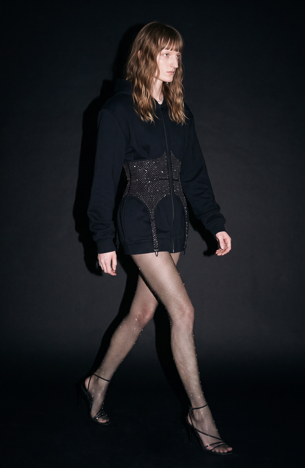 Women's black zip-up hoodie with hood, long sleeves and silver-studded corset-style front panel