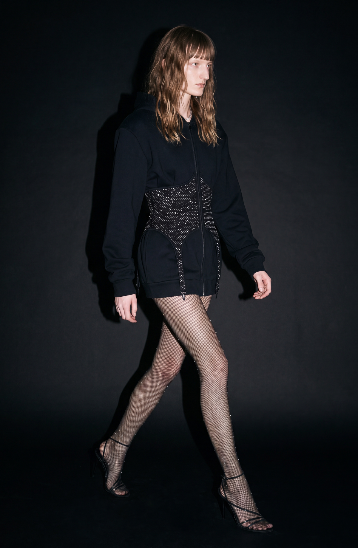 Women's black zip-up hoodie with hood, long sleeves and silver-studded corset-style front panel
