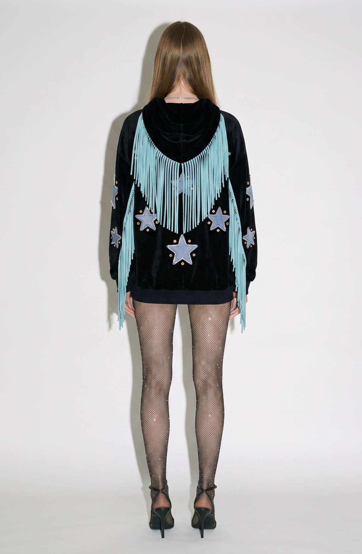 Black hooded hoodie with blue star appliques and turquoise fringe trim