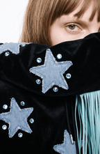 Black hooded hoodie with blue star appliques and turquoise fringe trim
