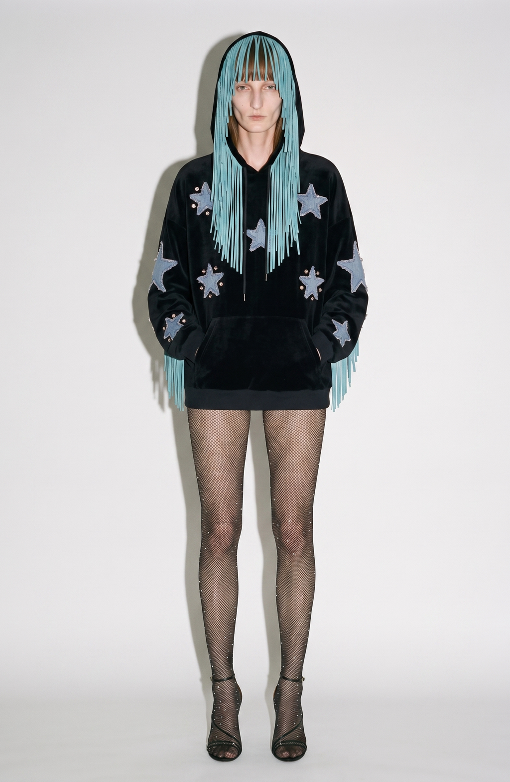 Black hooded hoodie with blue star appliques and turquoise fringe trim