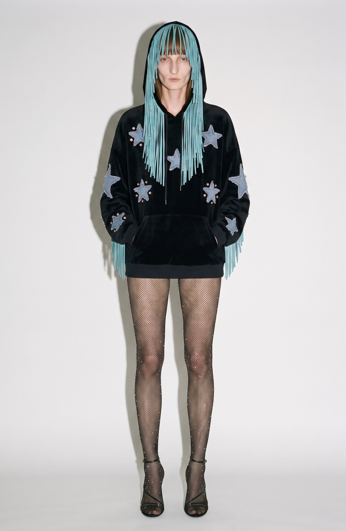 Black hooded hoodie with blue star appliques and turquoise fringe trim