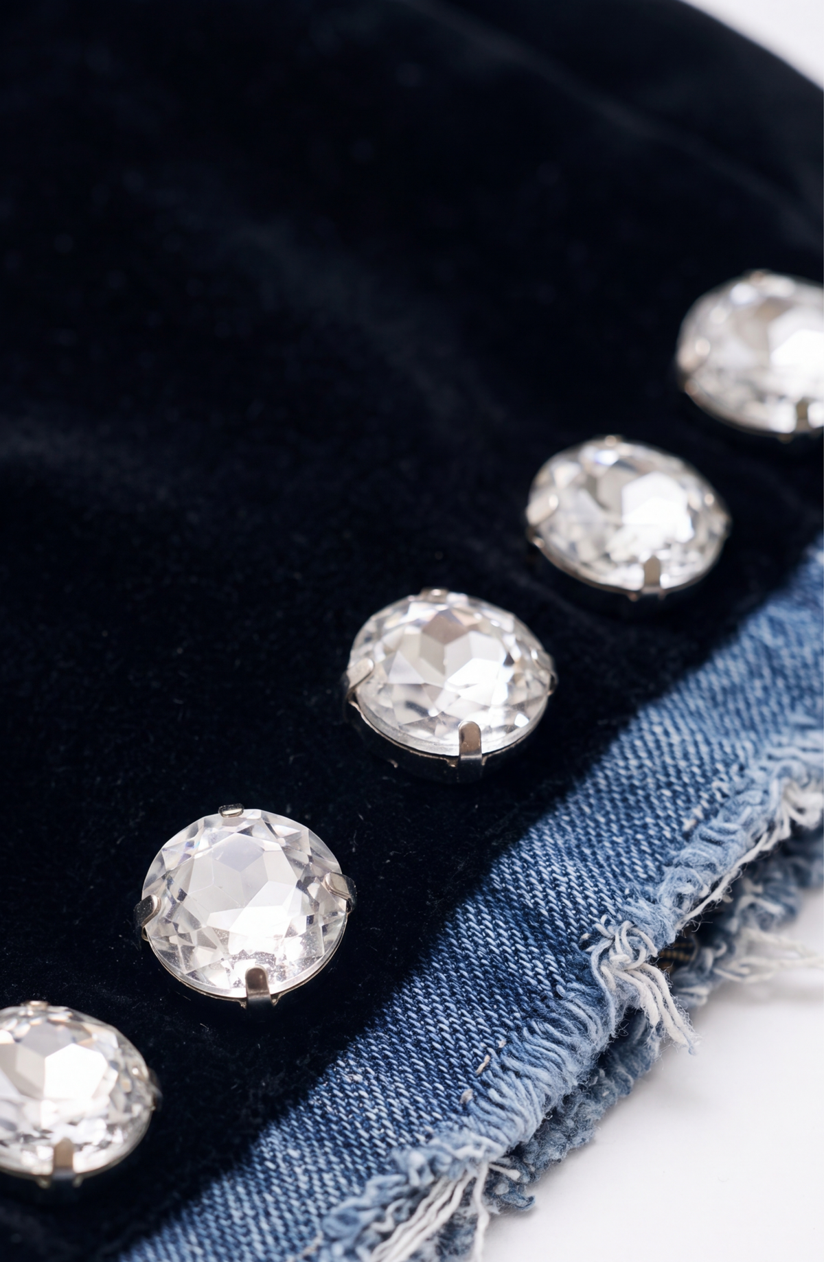 Women's dark blazer with frayed denim-effect lapels, sparkling embellishments and long sleeves
