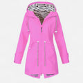 Women's longline hooded jacket with striped lining and zipped pockets