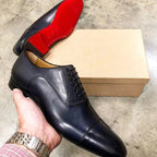 Men's cap toe Oxford shoes with lace-up fronts and contrasting soles