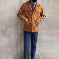 Men's utility hunting jacket with notched lapels, four flap pockets and button front