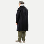 Men's navy overcoat with long sleeves, notched collar and button front