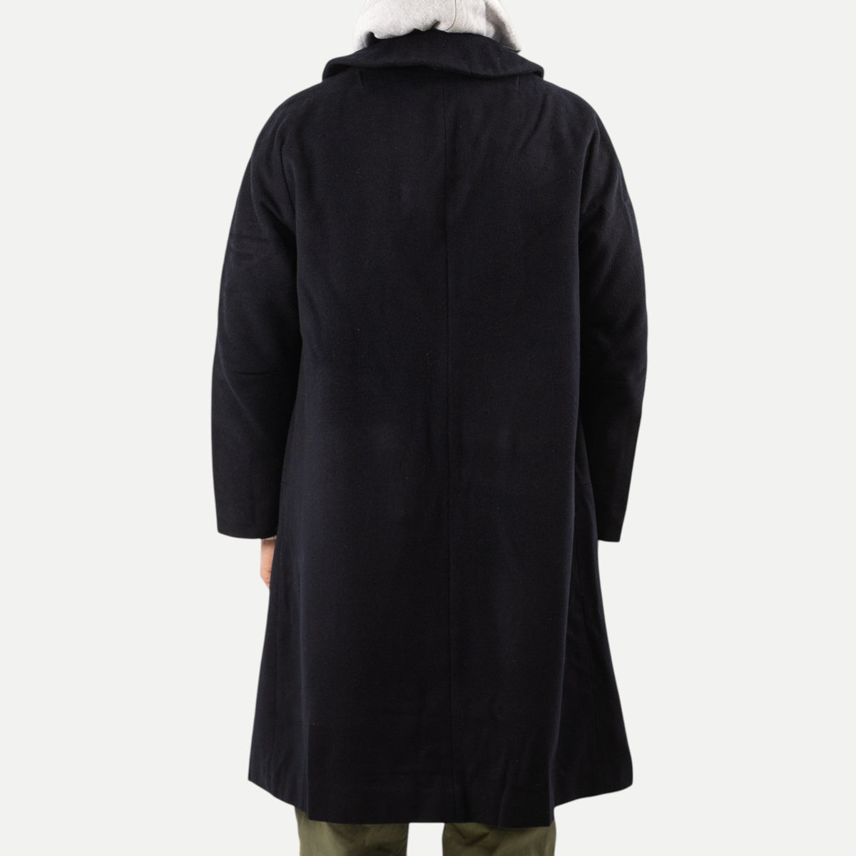 Men's navy overcoat with long sleeves, notched collar and button front