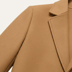 Men's long overcoat with notched lapels, button front and side pockets
