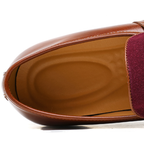 Men's plain penny loafers with almond toes, strap detail and flat soles
