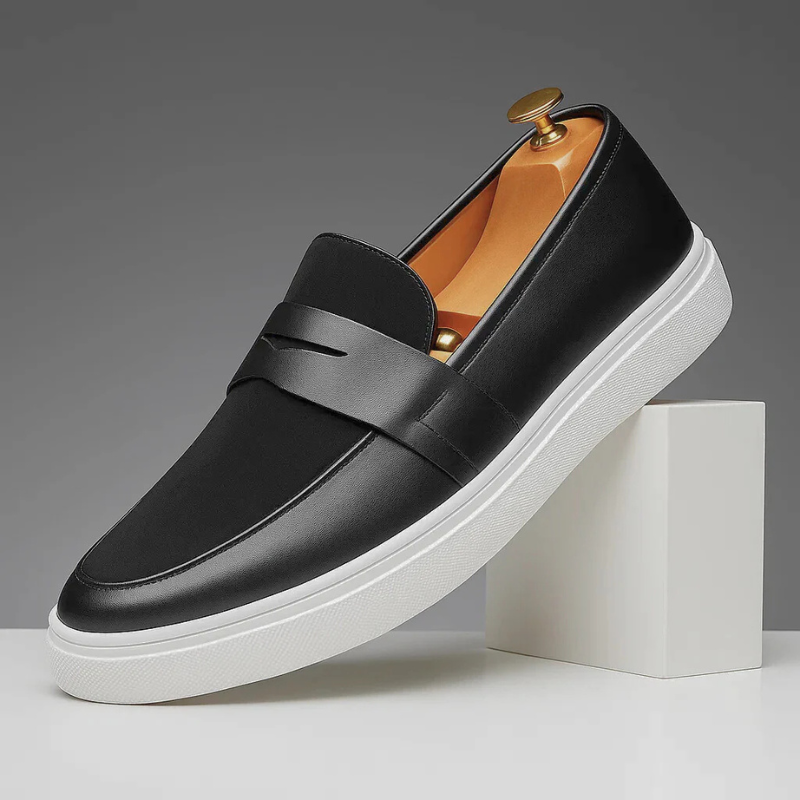 Men's plain penny loafers with almond toes, strap detail and flat soles