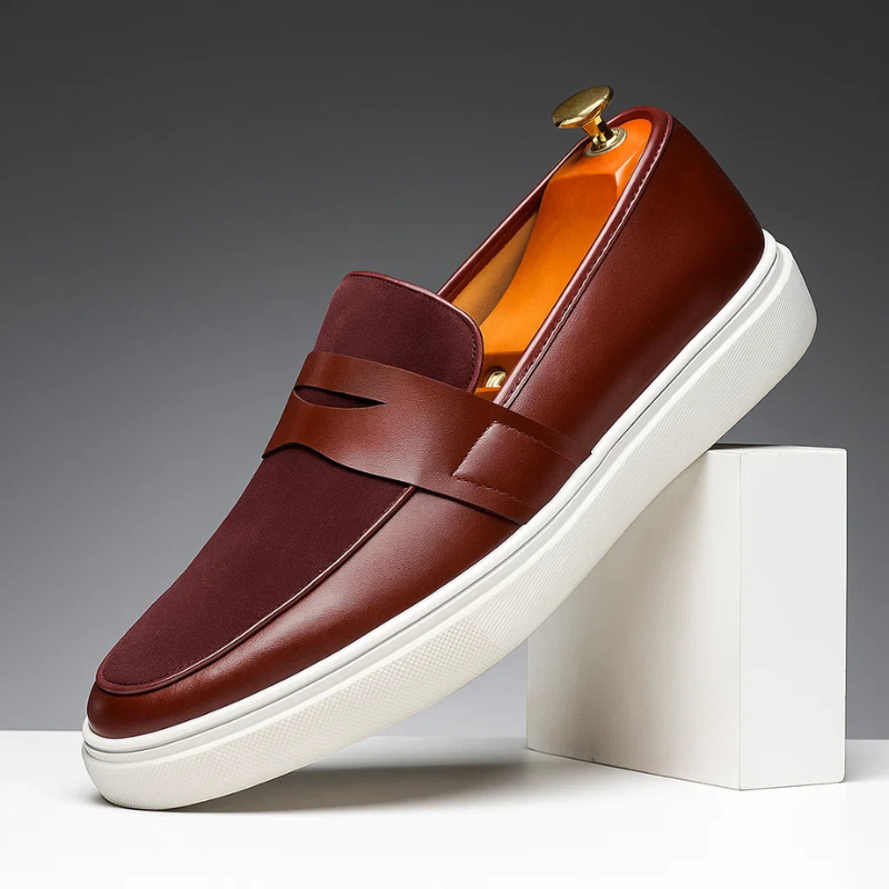 Men's plain penny loafers with almond toes, strap detail and flat soles