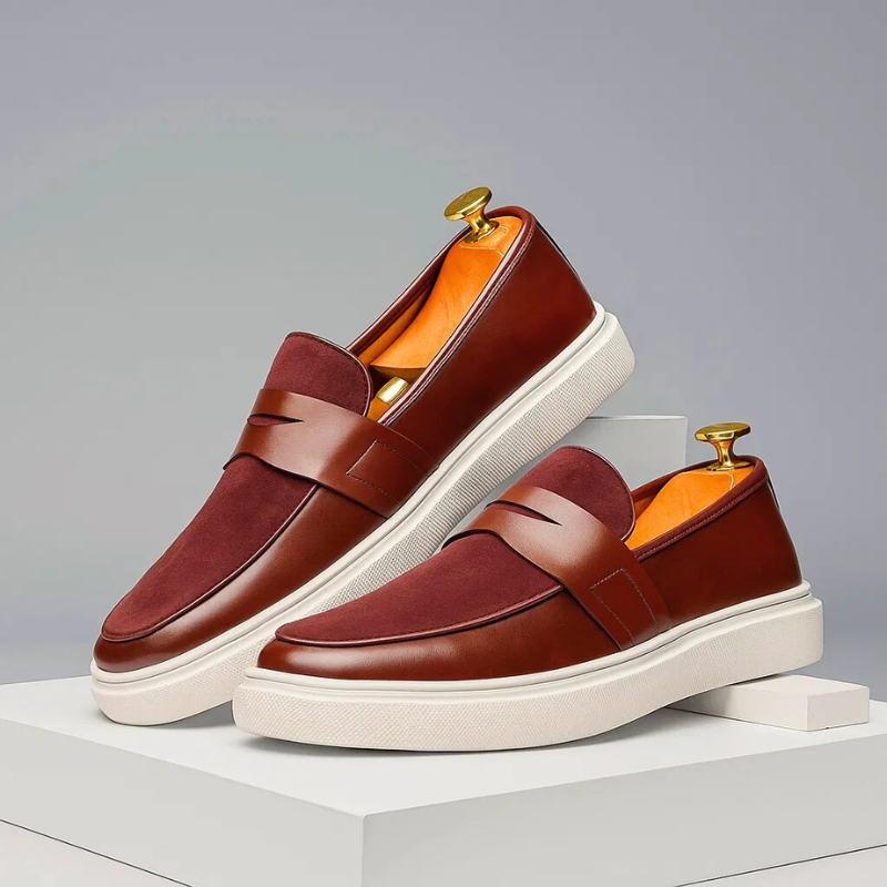Men's plain penny loafers with almond toes, strap detail and flat soles