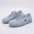 Panelled lace-up sneakers with rounded toes and chunky segmented soles