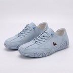 Panelled lace-up sneakers with rounded toes and chunky segmented soles