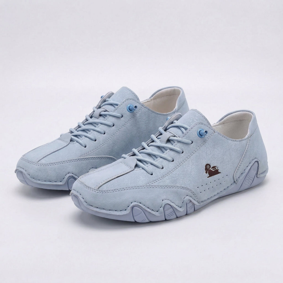 Panelled lace-up sneakers with rounded toes and chunky segmented soles