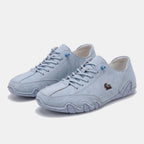 Panelled lace-up sneakers with rounded toes and chunky segmented soles