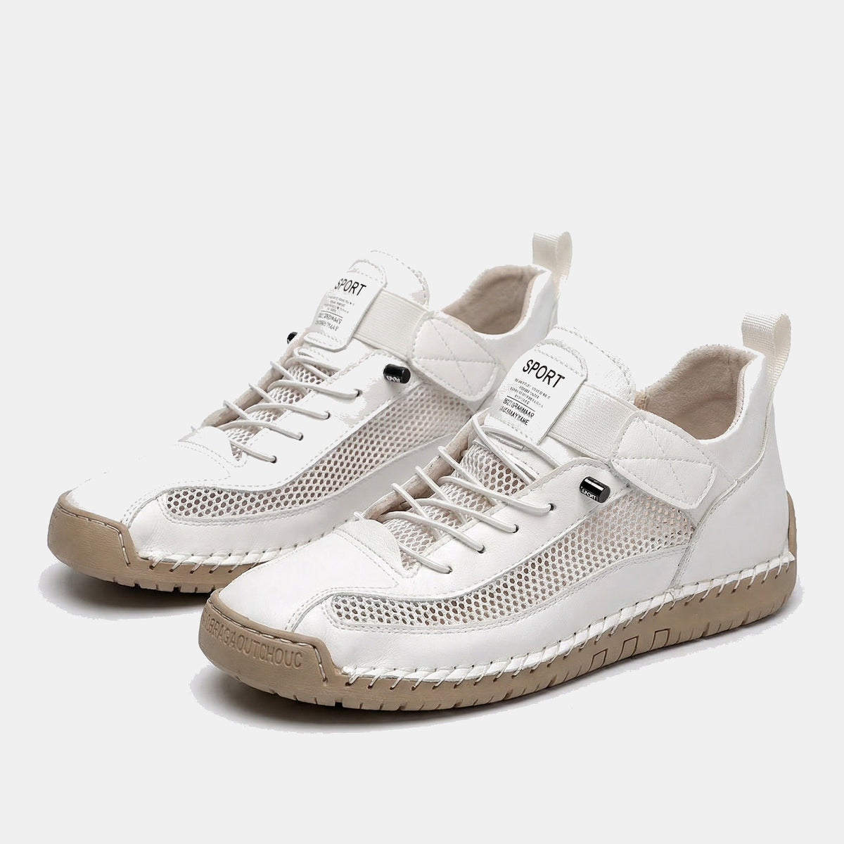 Women's lace-up trainers with mesh side panels, rounded toe and flat textured sole