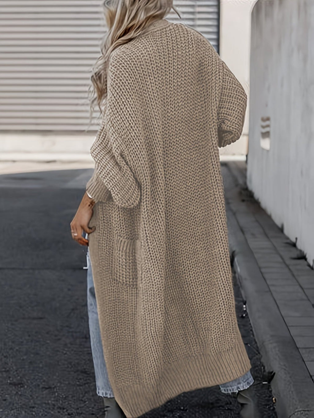 Women's long textured open front cardigan with balloon sleeves and front pockets