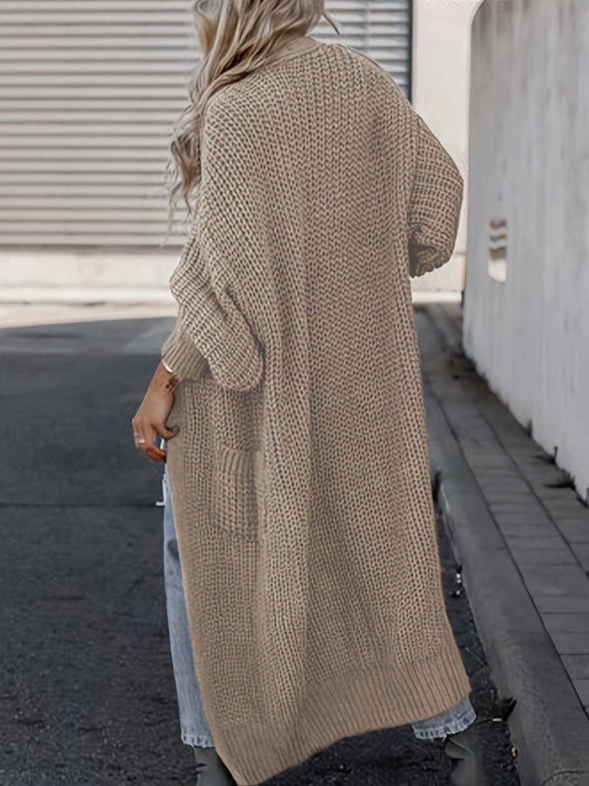 Women's long textured open front cardigan with balloon sleeves and front pockets
