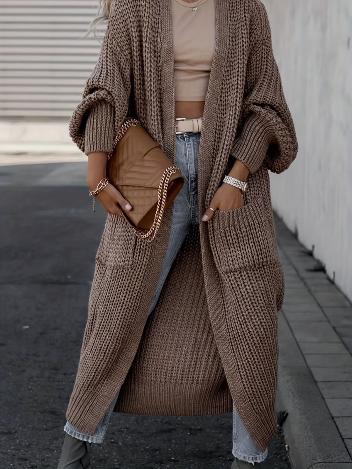 Women's long textured open front cardigan with balloon sleeves and front pockets