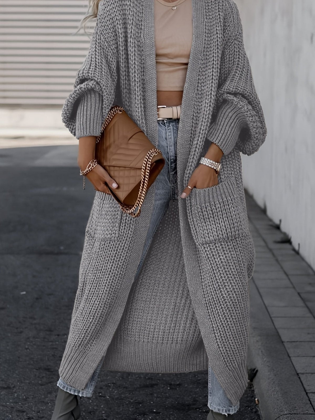 Women's long textured open front cardigan with balloon sleeves and front pockets
