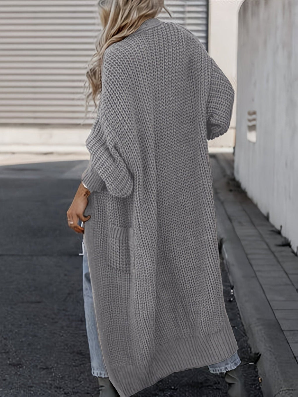 Women's long textured open front cardigan with balloon sleeves and front pockets