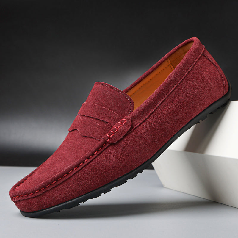 Men's slip-on loafers with moc toes, penny straps and stitched edging in navy and red colourways